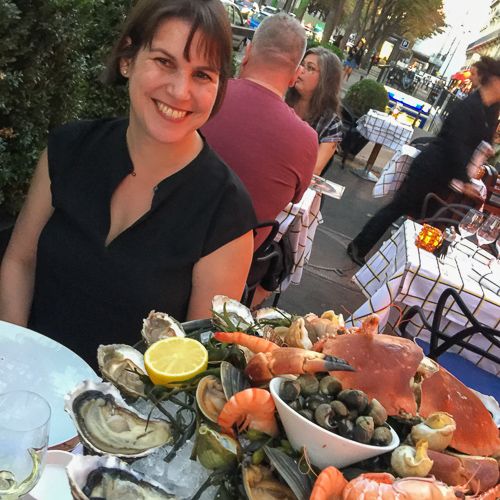 Nora Maynard in Paris with seafood tower.